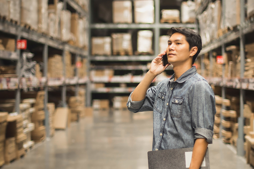 Warehouse manager satisfying customer demand for speedy shipping
